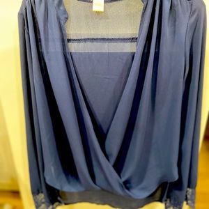 Sheer blue blouse with lace sleeve detail